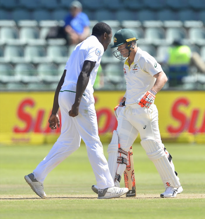 South Africa bowler Kagiso Rabada gives Australian opening batsman David Warner an inappropriate verbal sending off after the pace bowler got his wicket during day 3 of the 2nd Sunfoil Test match at St Georges Park on March 11, 2018 in Port Elizabeth, South Africa.