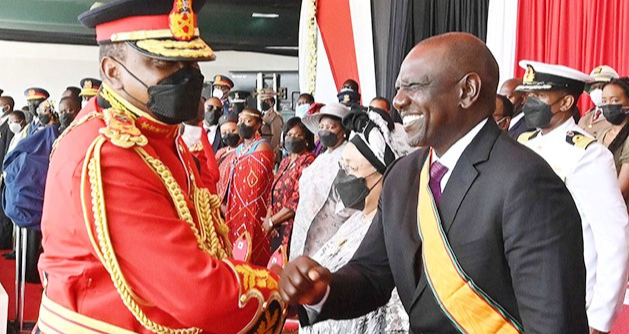 President Uhuru Kenyatta and Deputy President William Ruto greet each other on Jamhuri Day national celebrations at Uhuru Gardens in Nairobi on December 12, 2021