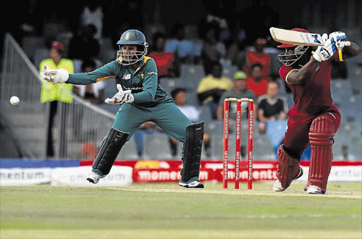 OUT OF REACH: Proteas women’s wicketkeeper Trisha Chetty narrowly misses fielding a shot played by Deandre Dottin from the West Indies during the second One Day International played at Buffalo Park on Saturday. The West Indies won by 57 runs Picture: ALAN EASON