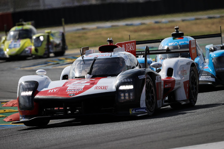 The No.8 Toyota Gazoo Racing GR010 Hybrid of Sebastien Buemi, Brendon Hartley and Ryo Hirakawa in action at the Le Mans 24 Hours Race on June 11, 2022 in Le Mans, France.