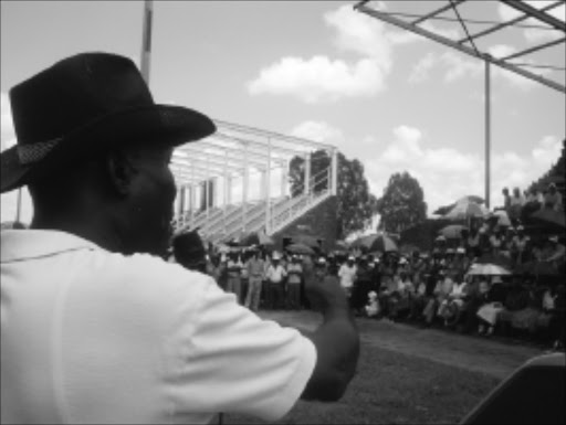 FIGHTING TALK: Jomo Mogale speaking to Khutsong residents yesterday.They want Merafong officials to deliver or leave.PIC: GETRUDE MAKHAFOLA. 07/02/2010. © Sowetan.