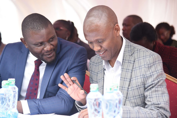 LOMPASAGO sacco board member Brian Muluma and Nairobi County Secretary Jairus Musumba during the Annual General Meeting at City Stadium, Nairobi on March 26, 2023.