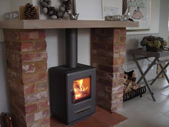 Installation of wood burning stove. album cover