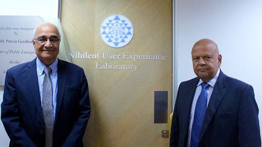 LC Singh, Nihilent executive vice-chairman, and public enterprises minister Pravin Gordhan during the official opening of Nihilent's UX lab in Johannesburg.