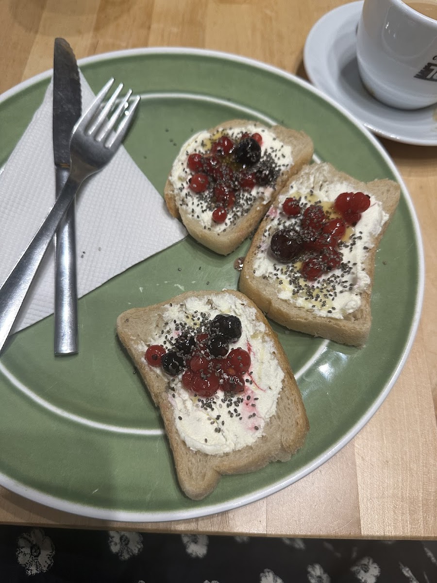 GF toast with cheese and berries.