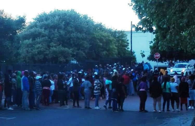 Protesters from Imizamo Yethu block the road outside Hout Bay library on April 26 2019.