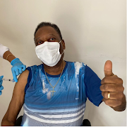 Brazilian soccer great Pele, 80, receives a dose of the coronavirus  vaccine in Brazil, in this image posted on his Instagram account on March 2, 2021. 