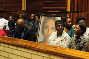 The Gardee family seated with EFF leadership in the Nelspruit magistrate’s court.