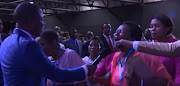 Pastor Shepherd Bushiri 'heals' congregants through prayer.
