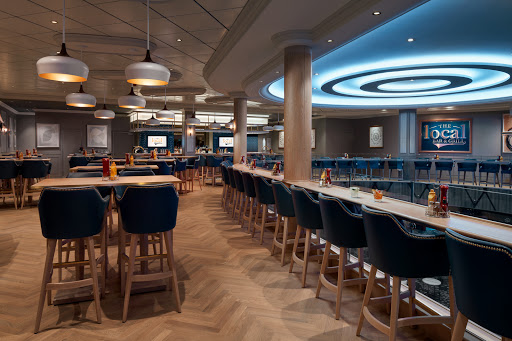  Pull up a stool with some friends at the Local Bar and Grill on Norwegian Encore.