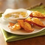 Crispy Wontons with Pineapple-Jalapeno Dipping Sauce was pinched from <a href="http://www.smuckers.com/Recipes/Details.aspx?recipeID=7079" target="_blank">www.smuckers.com.</a>