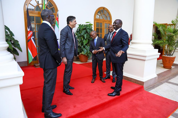 President William Ruto with telcos bosses and other officials in State House on January 10, 2023.