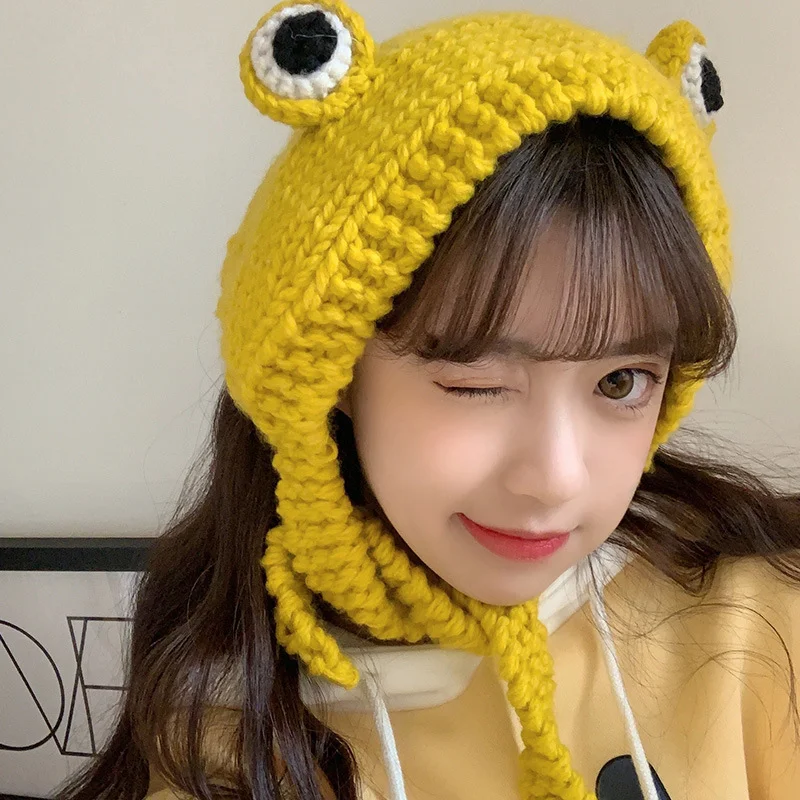 Cappello di lana a forma di rana dagli occhi grandi