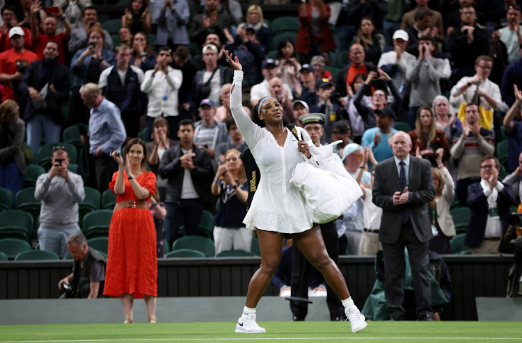 Serena Williams of The United States waves to the crowd after losing against Harmony Tan of France in the first round of the Wimbledon Championships in London on June 28, 2022