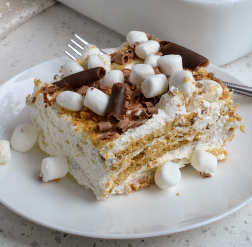 This easy Icebox Cake is made with just six simple ingredients and minimal effort. It is always a huge hit with friends and family.  On top of that it is totally customizable so be sure to read the section on recipe variations.