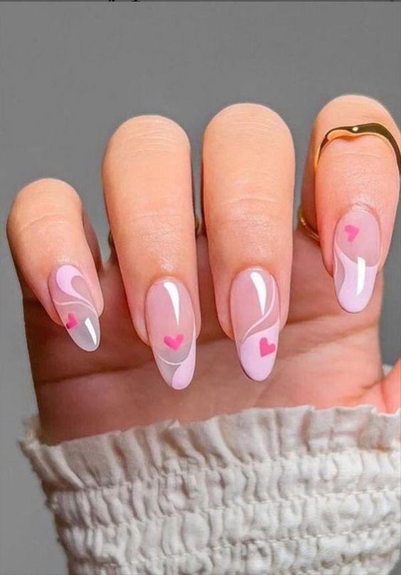 Delicate heart and nude on long nails