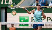 Iga Swiatek of Poland in action against Qinwen Zheng of China in their French Open fourth round match at Roland Garros in Paris on May 30 2022.