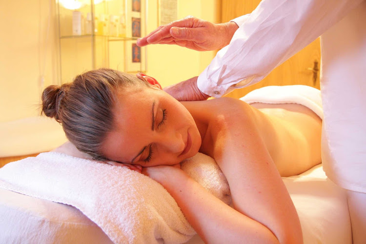 Feel revitalized after a massage treatment at a spa with licensed clinicians. 