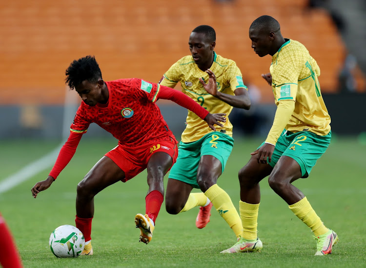 Ethiopia's Abubeker Nassir in action with South Africa's Nyiko Mobbie and Bongokuhle Hlongwane