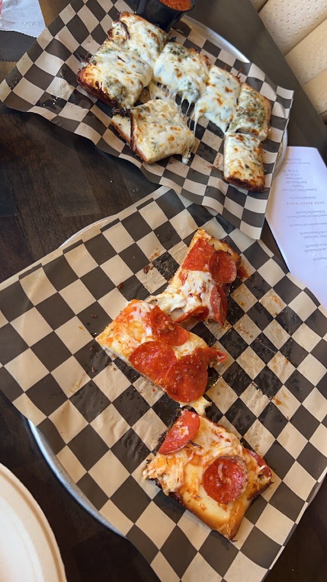 Almost forgot a picture it was so good. Gf pizza and cheesy bread