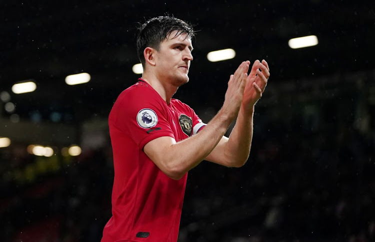 Manchester United's Harry Maguire applauds fans after the match against Norwich City at Old Trafford, Manchester, Britain, on January 11 2020.