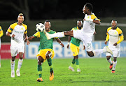 Divine Lunga of Golden Arrows challenged by Phakamani Mahlambi of Mamelodi Sundowns during the Absa Premiership 2018/19 match between Golden Arrows and Mamelodi Sundowns at Princess Magogo Stadium, Durban on 19 September 2018.