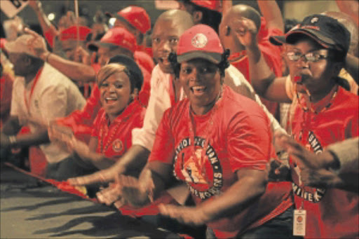 Delegates sing revolutionary songs during the NUM Congress at Emperors Palace in May. PHOTO: KATHERINE MUICK-MERE