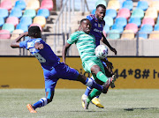 BLOEMFONTEIN, SOUTH AFRICA - NOVEMBER 07:Victor Letsoalo of Bloemfontein Celtic challenged by Teboho Mokoena and Bongani Khumalo of Supersport United during the MTN8, Semi Final 2nd Leg between Bloemfontein Celtic and SuperSport United on November 07, 2020 at the Seisa Ramabodu Stadium in Bloemfontein, South Africa.