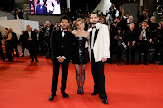  Abel “The Weeknd” Tesfaye, Lily-Rose Depp and Sam Levinson attend the red carpet during the Cannes film festival. 

