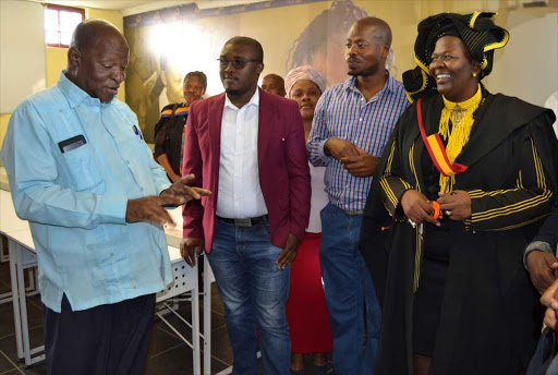 TECHNOLOGY BOOST: Education MEC Mandla Makupula demonstrates his typing skills during the handing over of computers to Masibonisane Senior Secondary School on Friday, while Ngqushwa Municipality acting mayor, Sanga Maneli, and school fundraisers Mziwethu Myali and Nomfundo Nqinana look on. In the background are the school’s principal, Nomakhwezi Madwanya, and ward councillor Noluphumzo Mpoli Picture: LOYISO MPALATSHANE