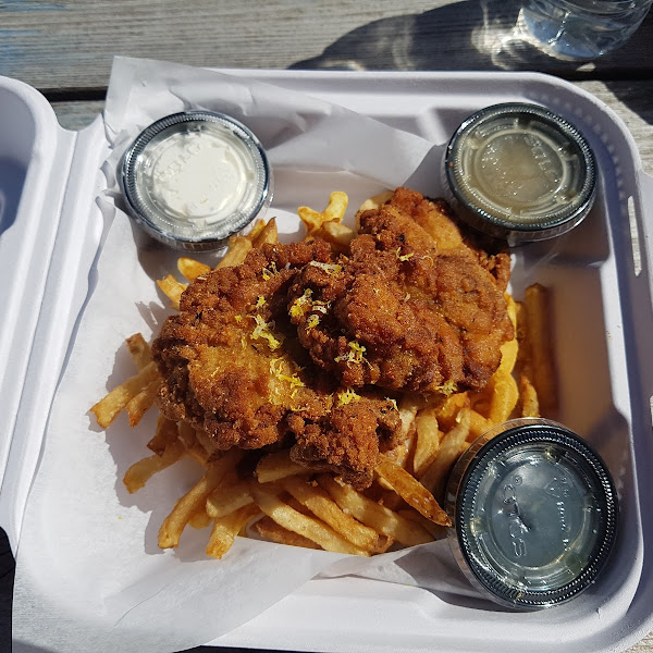 2 piece Chicken & lg round waffle and fries with maple syrup,  chicken gravy and sour cream