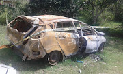 Constable Senzeni Msipha's burnt-out vehicle at the Mtunzini Police Station.