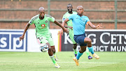 Evidence Mokgopa of Orlando Pirates and Richards Bay captain Simphiwe Mcineka during the DStv Premiership match at King Zwelithini Stadium in Umlazi, Durban on Saturday.