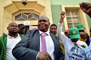 Nelson Mandela Bay mayor Mongameli Bobani (grey blazer) during a municipal council meeting on May 23 2017.