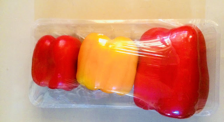 Red and yellow bell peppers Image: HANNIE PETRA