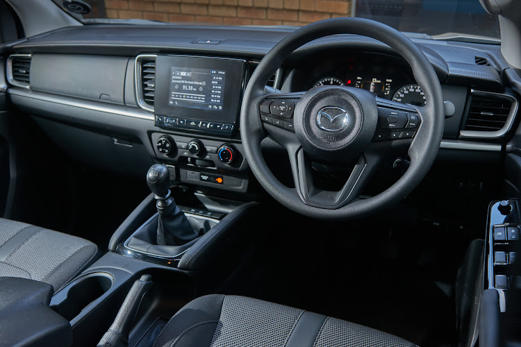 The dashboard is clad in soft touch materials and features a seven-inch touchscreen infotainment system compatible with Apple CarPlay and Android Auto.