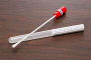 DNA test tube and cotton swab.