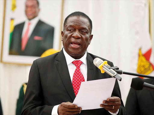 Zimbabwean President Emmerson Mnangagwa officiates the swearing-in of his cabinet at State House in Harare, December 4, 2017. /REUTERS