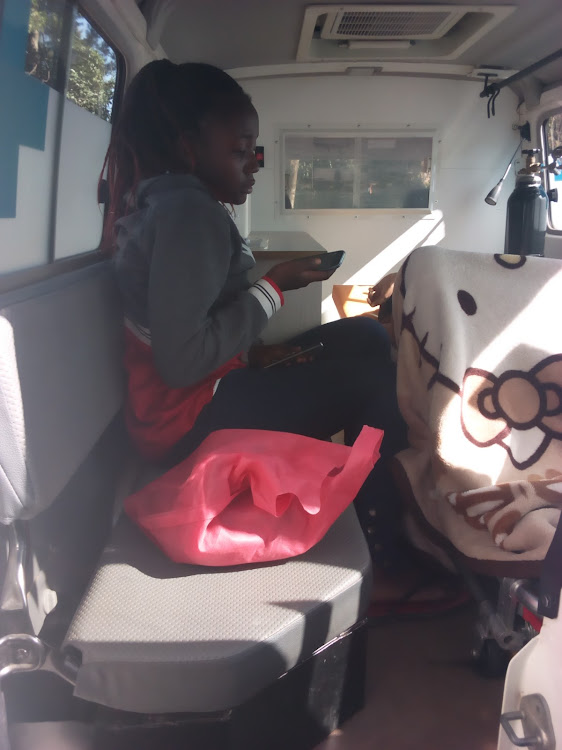 A Kaimosi student in an ambulance at Mbale Referral Hospital as they wait to be referred to Kakamega.