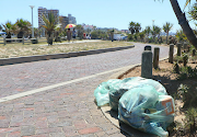 Refuse bags lie uncollected close to Something Good on the beachfront. Only 14 out of 200 temporary workers turned up to clean Port Elizabeth’s beaches at the start of the festive season.