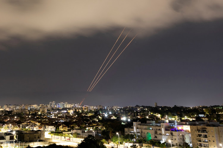 An anti-missile system operates after Iran launched drones and missiles towards Israel, as seen from Ashkelon, Israel, on April 14 2024. Photo: AMIR COHEN/REUTERS