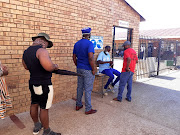 Hammanskraal residents as they enter Motjibosane primary school voting station.