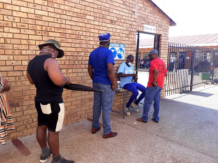 Hammanskraal residents as they enter Motjibosane primary school voting station.