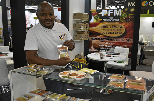 Limpopo spices manufacturer Phuti Lamola with a range of his spices at his company Phuti Food Manufacturing.