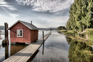 Fetsund Lenser by Jon Eggen -   ( fetsund lenser, fetsund, blue sky, timber floating, reflections, akershus, norway, clouds, water, trees, norge, floating house )