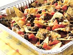 Grilled Picnic Taco Nachos was pinched from <a href="http://www.bettycrocker.com/recipes/grilled-picnic-taco-nachos/144a1812-6320-4d92-876b-2f2d78bb9350?nicam2=Email" target="_blank">www.bettycrocker.com.</a>