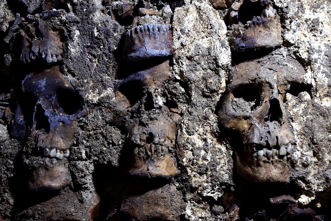 A part of an Aztec tower of human skulls, believed to form part of the Huey Tzompantli, a massive array of skulls that struck fear into the Spanish when they captured the city, at the Templo Mayor archaeology site, in Mexico City.