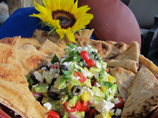 A crowd pleaser every time it is served.  This salsa has a Greek twist full of fresh veggies and topped with tangy feta cheese.