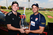 Jon-Jon Smuts of the Warriors and Albie Morkel of the Titans with the trophy during the Momentum One Day Cup Final Media Briefing at SuperSport Park on March 30, 2017 in Pretoria, South Africa.