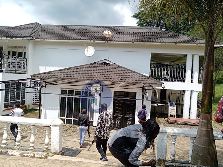 Police officers outside Former Kakamega senator Cleophas Malala on September 1.